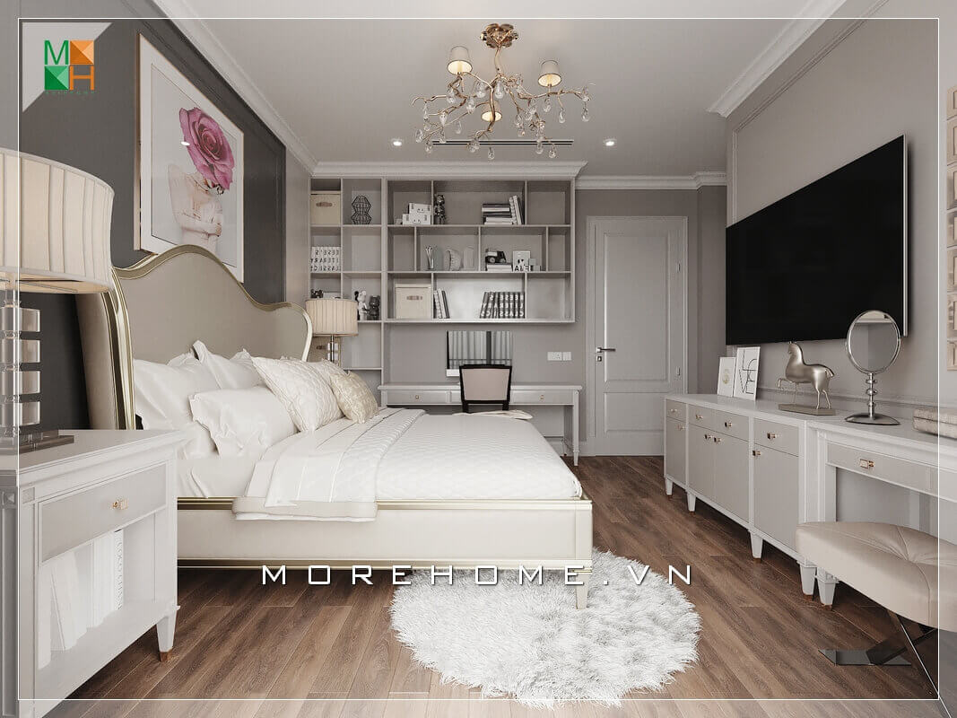 Mẫu thiết kế nội thất phòng ngủ chung cư tân cổ điển là sự chắt lọc tinh túy từ cổ điển, cộng thêm nét phóng khoáng của con người hiện đại. Điều đó thể qua sự sáng tạo thiết kế chiếc giường với họa tiết uốn lượn điêu luyện phía đầu giường kết hợp với kệ tivi và kệ giá sách hiện đại tạo nên một không gian phòng ngủ đẹp mặt, vì thế thiết kế nội thất phòng ngủ tân cổ điển luôn đem đến những giá trị tuyệt vời và hoàn hảo. Mẫu nội thất biệt thự tân cổ điển, hiện đại đẹp